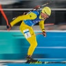 Fredrik Lindstroem of Sweden, skis to a gold medal in the men's 4x7.5-kilometer biathlon relay at the 2018 Winter Olympics