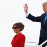 President Donald Trump and first lady Melania Trump arrive on Air Force One at Orly Airport in Paris