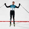 Eric Frenzel, of Germany celebrates after winning the the gold medal in the men's 10km cross-country race at the Winter Olympics