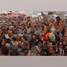 Participants dance on the playa at the annual Burning Man arts and music festival in the Black Rock Desert of Nevada, August 29