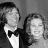 Country singers Glen Campbell, and Tanya Tucker, are shown at the Grammy Awards in Los Angeles, Feb. 15, 1979. 