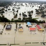 Water from Addicks Reservoir flows into neighborhoods as floodwaters from Tropical Storm Harvey rise in Houston, August 29, 2017