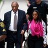 Bill Cosby arrives for the first day of his sexual assault trial at the Montgomery County Courthouse with actress Keshia Knight Pulliam on June 5, 2017.