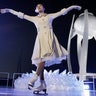 South Korean Olympic figure skating champion Yuna Kim performs before lighting the Olympic flame in Pyeongchang