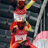 Tobias Arlt and Tobias Wendl of Germany celebrate their gold medal winning run in men's double luge at the Winter Olympics