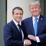 French President Emmanuel Macron greets President Donald Trump at the Elysee Palace in Paris, France