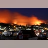 Chile, a wildfire approaches Chile's Dichato community where firefighters are working to keep the flames away from the estimated 800 homes. 