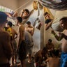  Suspects of violent crime crowd a holding cell at the municipal police station in Cumana, Sucre state, Venezuela.