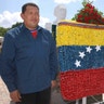 Hugo_Chavez_flowers_flag