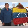 Hugo_Chavez_flowers_flag