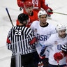 Referees break up a fight between Russian athlete Vladislav Gavrikov (4) and American Noah Welch (5)