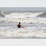Surfer braves the swell