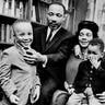 FILE - In this March 17, 1963, file photo, Dr. Martin Luther King Jr. and his wife, Coretta Scott King, sit with three of their four children in their Atlanta, Ga., home. From left are: Martin Luther King III, 5, Dexter Scott, 2, and Yolanda Denise, 7. On April 4, 1968, a movement lost its patriarch when the Rev. Martin Luther King Jr. was killed on a hotel balcony in Memphis. Yolanda, Martin, Dexter and Bernice King lost their father. (AP Photo/File)
