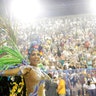 A dancer from the Paraiso do Tuiuti samba school performs at the Sambadrome in Rio de Janeiro. 