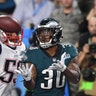  Philadelphia Eagles Corey Clement catches a touchdown pass in front of New England Patriots Marquis Flowers in Super Bowl 52