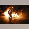 Protesters stand near a burning barricade during the demonstration during the G20 summit in Hamburg, Germany, July 6, 2017