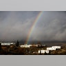 A rainbow is seen over the Israeli settler outpost of Amona in the occupied West Bank.
