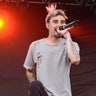 BRIDGEVIEW, IL - JULY 17:  Kyle Pavone of We Came as Romans performs during Chicago Open Air 2016 at Toyota Park on July 17, 2016 in Bridgeview, Illinois.  (Photo by Daniel Boczarski/Redferns)