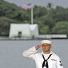 US Navy Musician salutes during ceremony 