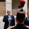 French President Emmanuel Macron and President Donald Trump during a welcoming ceremony at the Invalides in Paris