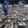 Evacuees escaping the floodwaters from Tropical Storm Harvey rest at the George R. Brown Convention Center in Houston, Tuesday