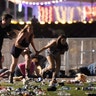  People run from the Route 91 Harvest country music festival during a shooting on Sunday evening in Las Vegas