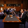 Former FBI Director James Comey before testifying to a Senate Intelligence Committee hearing