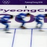 Team Korea during a training session for the finals of the men's team pursuit speedskating race at the 2018 Winter Olympics