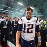 New England Patriots quarterback Tom Brady walks off the field after losing Super Bowl 52 to the Philadelphia Eagles
