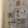 Children's artwork is displayed on the walls inside the KS Relief Center.