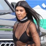 Kourtney Kardashian was spotted in a sheer top, flaunting her trim shape, with jeans and heels. X17online.com