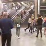 People running through Manchester Victoria station after an explosion at Manchester Arena in Manchester during a concert by Ariana Grande.