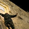 Aug_24_Libyan_Rebel_Tears_Down_Sign