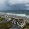 A storm front passes homes in North Topsail Beach, North Carolina prior to Hurricane Florence moving toward the east coast on Wednesday