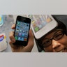 Apple_fans__silly_hats_in_Japan_2