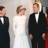 Prince Charles, Princess Diana greet George Bush and Barbra Bush during dinner at reception at the British Embassy