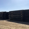  Stacks of steel bollard fencing are ready to be placed at the border