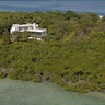 Broad Key, Key Largo FL. For Sale: $20,000,000. If the home is connected to land by a 180-foot-long bridge, is it still considered an island? Although this home doesn’t require a boat ride arrival, the wooden walkway is the only thing linking the home to the mainland. The 1,250-square-foot main house was built in 2000 and includes vaulted ceilings, wood flooring and a covered in-deck hot tub. An additional home, built in 1950, has been completely updated and has five bedrooms, three bathrooms and a custom kitchen with high-end appliances.