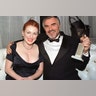 Burt Reynolds with his Golden Globe Award for 'Boogie Nights,' next to Julianne Moore in 1998.