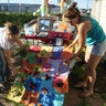 Erika_and_Fatima_set_up_an_altar_for_their_grandmother