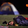 Firefighter_Rests_After_Battling_Wildfire