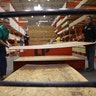 Home Depot employees load plywood ahead of the arrival of Hurricane Florence in Myrtle Beach, South Carolina, Tuesday