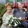 Newlyweds Stephen Hawking and Elaine Mason pose at their wedding in Cambridge, England, September 16, 1995. 