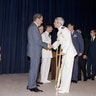 U.S. President Richard Nixon greets former Vietnam prisoner of war John McCain at a pre-POW dinner reception