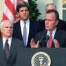 President George Bush addresses reporters at the White House with Senator John McCain (L) and Senator John Kerry