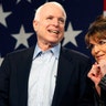 Senator John McCain and former Alaska Governor and VP candidate Sarah Palin acknowledge the crowd during a rally