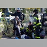 A woman is aided by first responders after a terror attack on a bike path in New York City, October 31