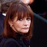 FILE - In this Oct. 3, 2000 file photo, actress Margot Kidder, who dated former Prime Minister Pierre Trudeau, arrives for his funeral at Notre-Dame Basilica in Montreal. Kidder's daughter says the Superman actress' death has been ruled a suicide. Maggie McGuan told The Associated Press Wednesday, Aug. 8, 2018, that she knew her mother died by suicide when she was brought to Kidder's house in May 2018, and that it is a big relief to have the truth out. (Adrian Wyld/The Canadian Press via AP, File)