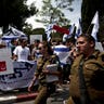 Israeli Soliders Passing by Supporters