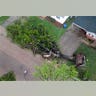 large tree toppled by a tornado, in Bridgeton, Mo.